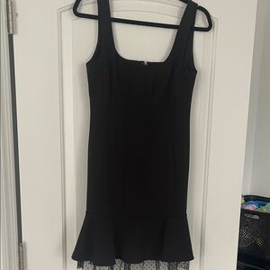 Elegant Black Dress with Mesh Hem